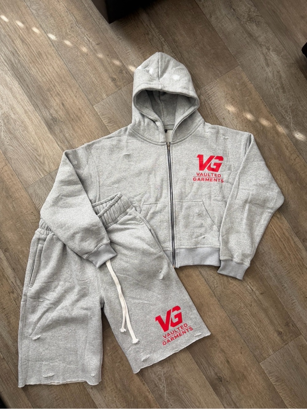 Light Gray Zip Hoodie with Red Logo